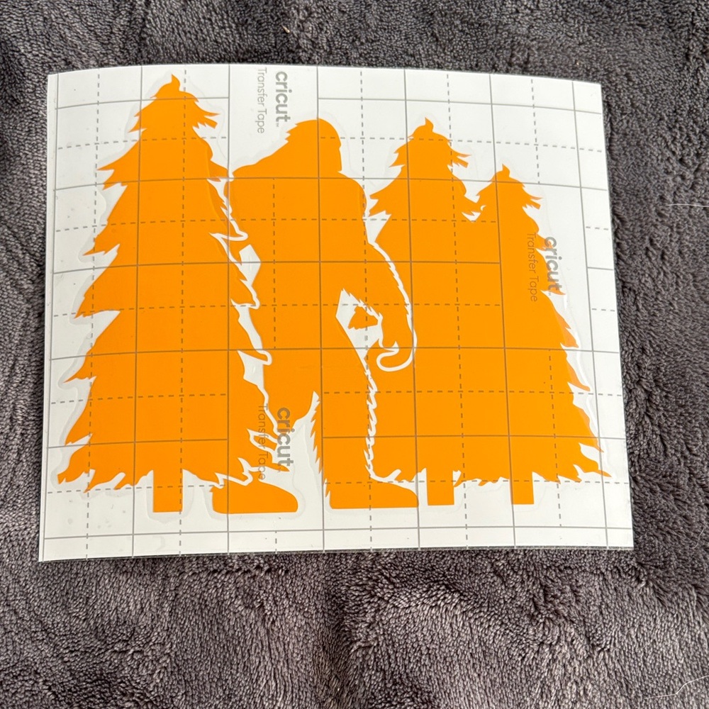 Orange Bigfoot and Trees Vinyl Decal